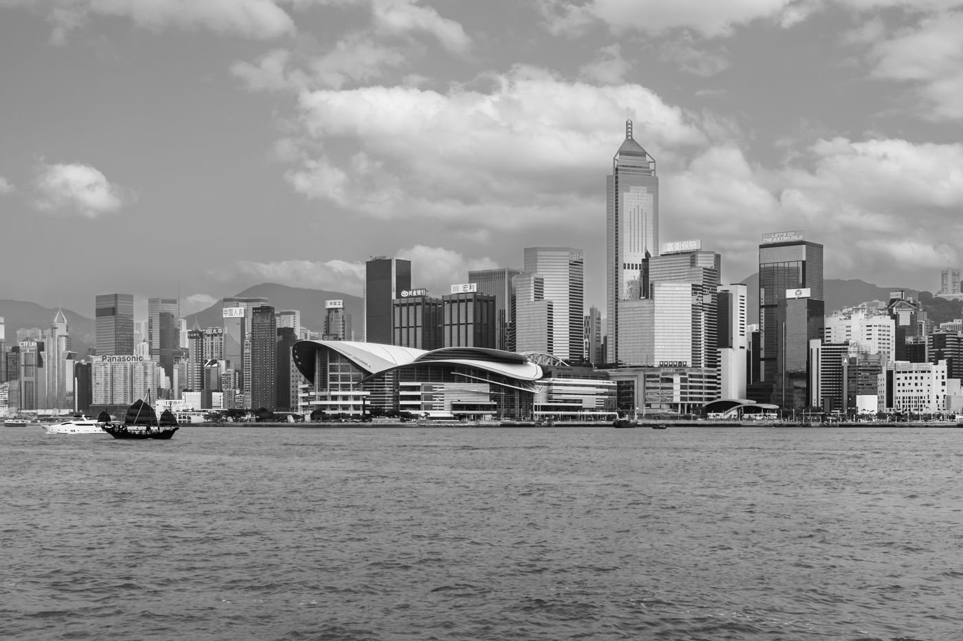 A real black-and-white Hong Kong harbour skyline, grounding the local-search discussion.