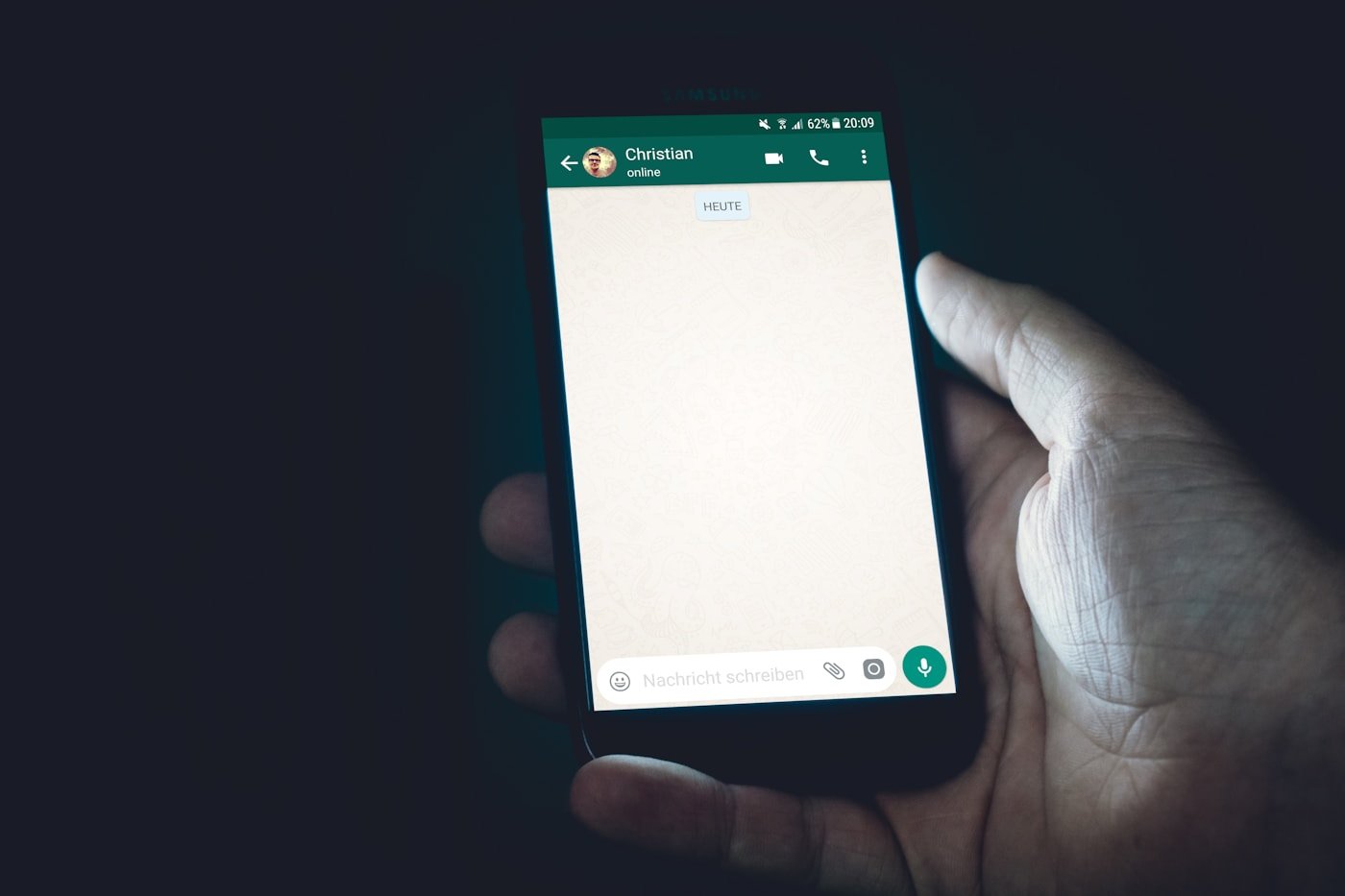An earlier WhatsApp conversation screen: sending is a separate step.