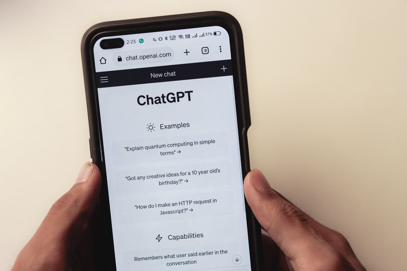 ChatGPT mobile webpage photographed in 2023, showing an earlier interface.
