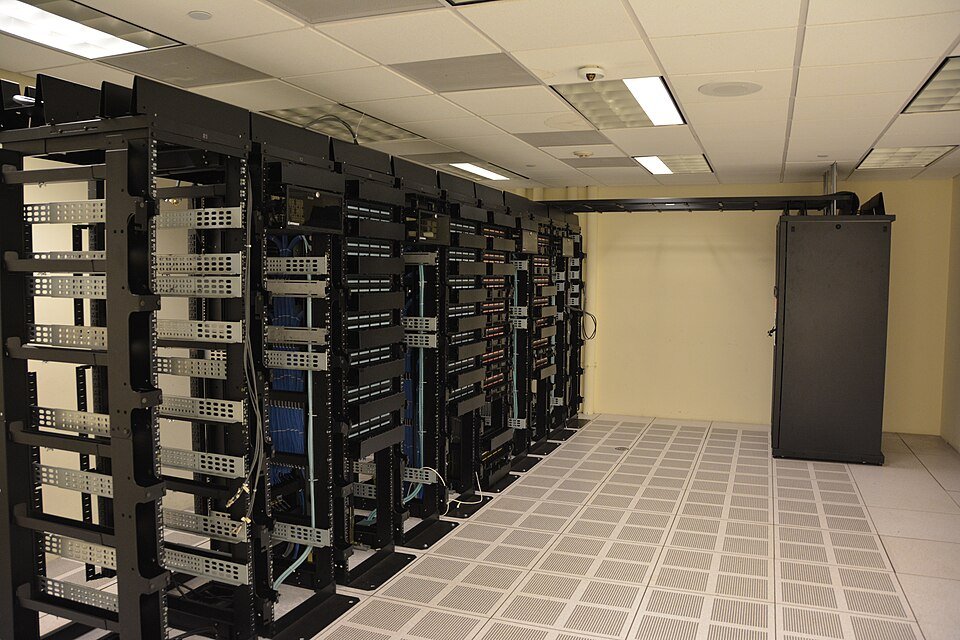 Rows of server racks inside a data centre
