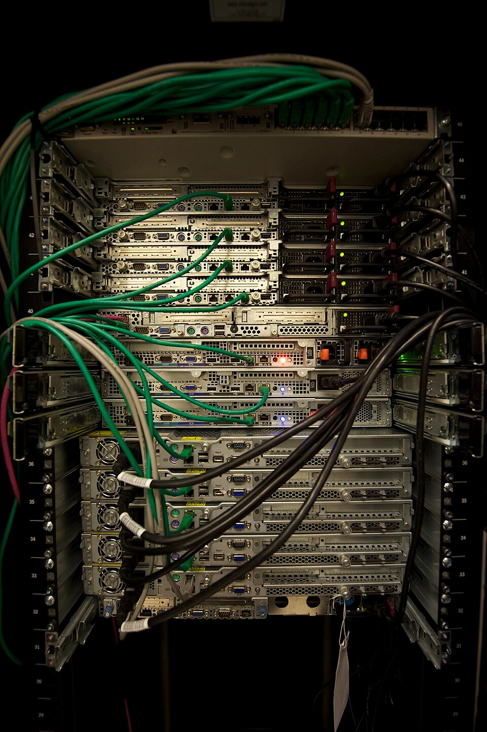 Rows of servers in a rack inside a data centre
